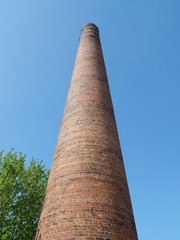 Brick factory chimney. The boiler plant. Smokestack boiler.
