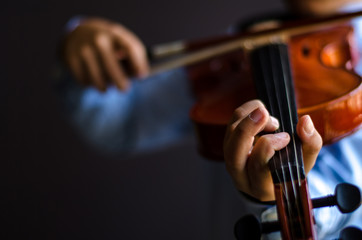 Young musician playing violin