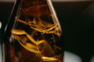 Bottle of beer with bubbles inside