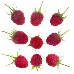 set of fresh red raspberries isolated on white background