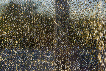 broken tempered glass closeup , background of glass was smashed close up