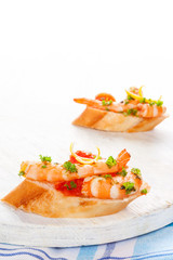 Shrimp snacks with bread.