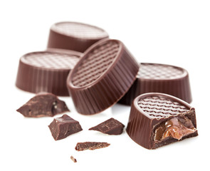 Chocolate candies close-up isolated on a white background.