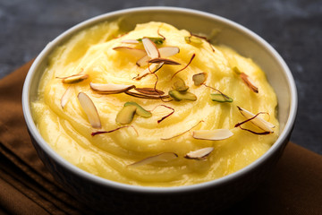 Shrikhand OR Srikhand is an Indian dessert made of strained yogurt, garnished with dry fruits and saffron.