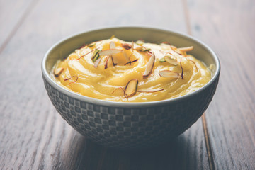 Shrikhand OR Srikhand is an Indian dessert made of strained yogurt, garnished with dry fruits and saffron.