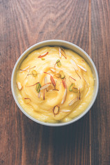 Shrikhand OR Srikhand is an Indian dessert made of strained yogurt, garnished with dry fruits and saffron.