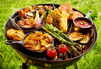 Assortment of fresh vegetables grilling on a BBQ