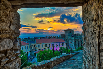 panoramic view of the old Byzantine Castle at sunset in the city of Thessaloniki , Greece