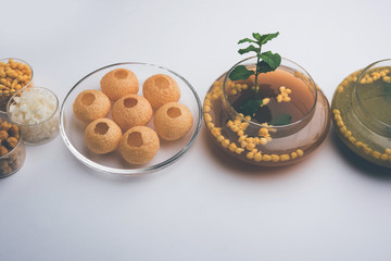 Pani Puri OR Golgappa is a popular Indian Chat menu, selective focus
