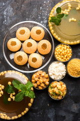 Pani Puri OR Golgappa is a popular Indian Chat menu, selective focus