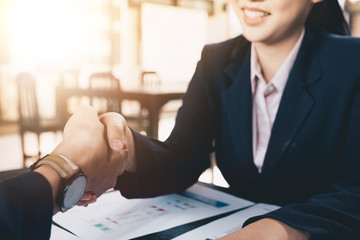 Business people shaking hands, finishing up meeting, business etiquette, congratulation, merger and acquisition concept