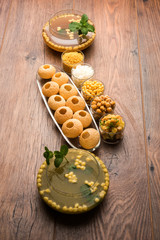 Pani Puri OR Golgappa is a popular Indian Chat menu, selective focus