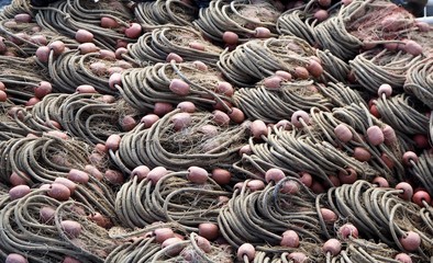 Fishermen nets neatly folded, ready to use. Texture. 