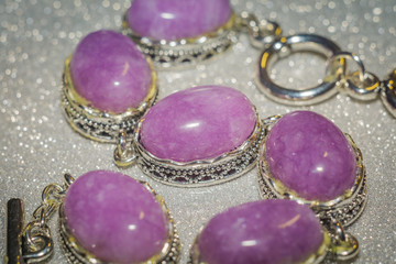 Silver jewellery with purple stone