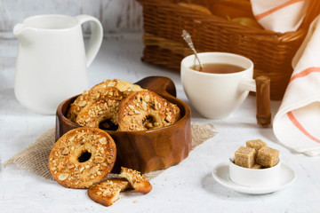 Homemade peanut cookies in a wooden bowl. Tea time in a rustic style.