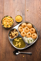 Pani Puri OR Golgappa is a popular Indian Chat menu, selective focus
