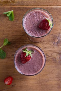 Milkshake with chocolate and strawberries. Chocolate strawberry smoothie. View from above, top studio shot