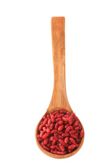 fresh red barberries in wooden spoon isolated on white