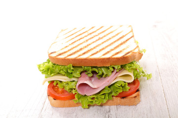 sandwich with lettuce, cheese and ham