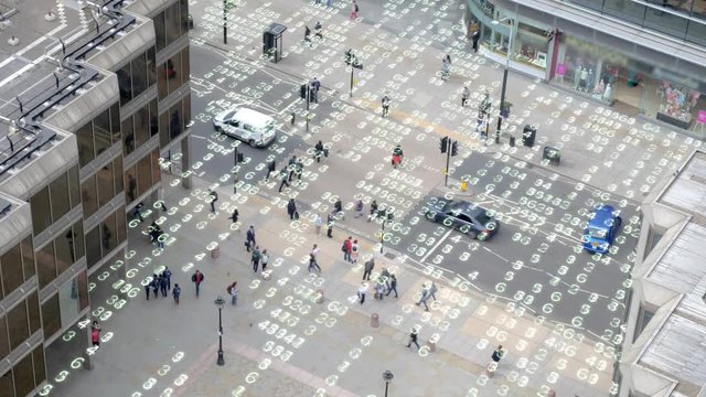 High angle shot of a London street overlaid with matrix style changing numbers.