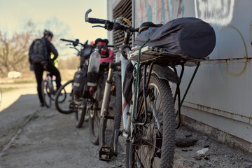 Group of cycle tourists stopped for rest, closeup photo