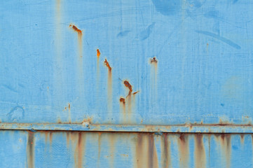 Rust on blue iron plate background