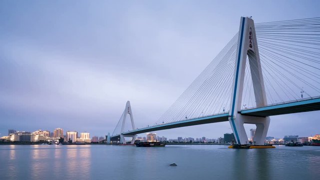 City skyline and sea bridge at night, Haikou, Hainan, China(Time-lapse photography)
