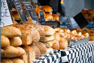 Selective focus, fresh sourdough breads on display at Kings Cross outdoor food market in London