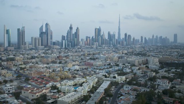 United Arab Emirates, Dubai, elevated view of the new Dubai skyline of modern architecture and skyscrappers on Sheikh Zayed Road - T/lapse