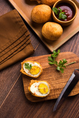 Tasty Egg Pakora or Pakoda served with tomato ketchup