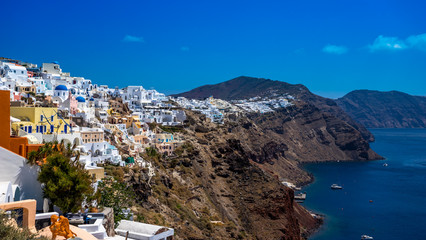 Fototapeta na wymiar Fira the capital of Santorini island in Greece at sunny day