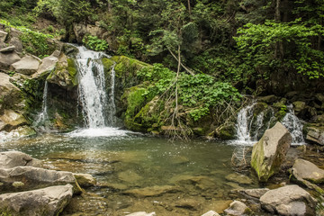 Small waterfall in mountain environment