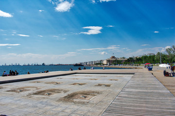 New Beach of Thessaloniki, overlooking the white tower, the statue of Alexander the Great and the commercial harbor