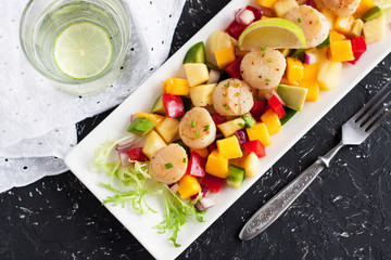 Seared scallops with mango and pineapple salsa