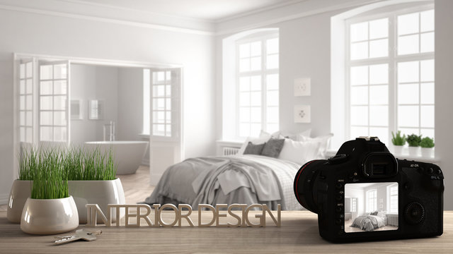 Architect photographer designer desktop concept, camera on wooden work desk with screen showing interior design project, blurred scene in the background, classic bedroom idea template