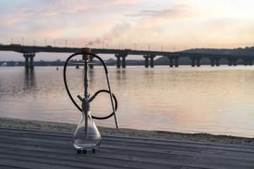 Hookah shisha smoke on beach background