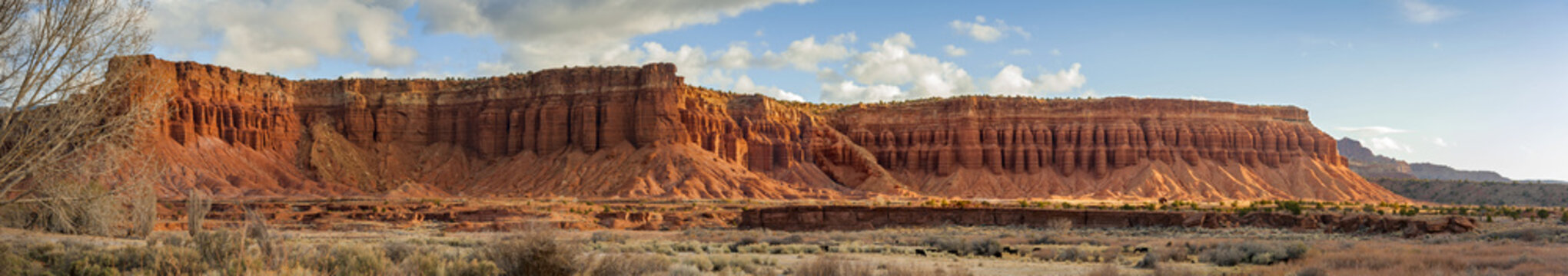 Red Rock Sandstone Formations in Torrey, Utah. Capitol Reef National Park is primarily made up of sandstone formations within the Waterpocket Fold, monocline that extends nearly 100 miles.