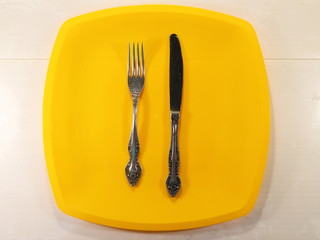 knife and fork on the table