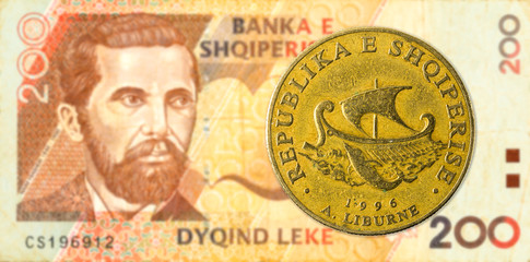 20 albanian lek coin against 200 albanian lek bank note