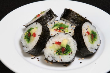 Sushi rolls served on a plate