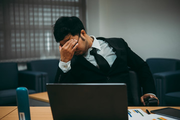 Asian businessman stressed from work,Furious from hard work,Boss complain about project,Thailand...