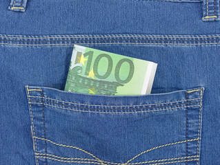Euro bills in jeans pocket