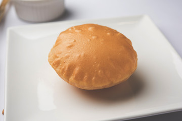 Homemade Fried Puri or Poori Or Indian Bread, selective focus