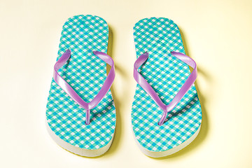 Slippers on a yellow background