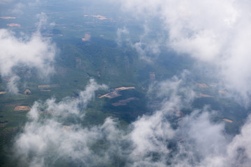 landscape look down from the airplane look see the sky and cloud beautiful