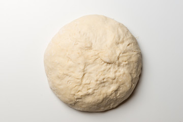 Raw dough on white background