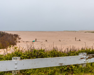 Fishing Pier buried in the shifting sand