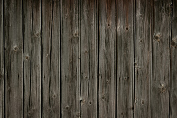 Vertical old wooden wall, fence, background texture.
