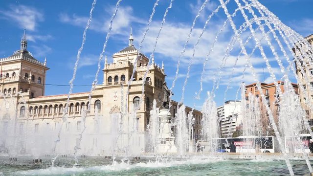 Fountain pouring water in Plaza Zorrilla Valladolid, Spain