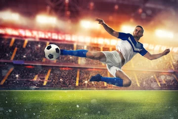 Foto op Plexiglas Voetbal Soccer striker hits the ball with an acrobatic kick